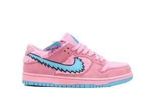 The Nike SB Dunk Low Grateful Dead SB Dunks Pink features a fuzzy pink faux-fur upper